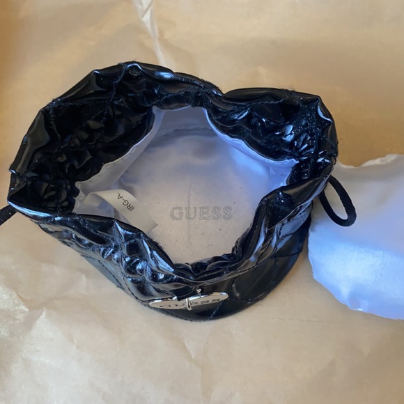 11:01  - 3/$25 Bundle Only GUESS Patent Drawstring Pouch - Picture 6 of 11